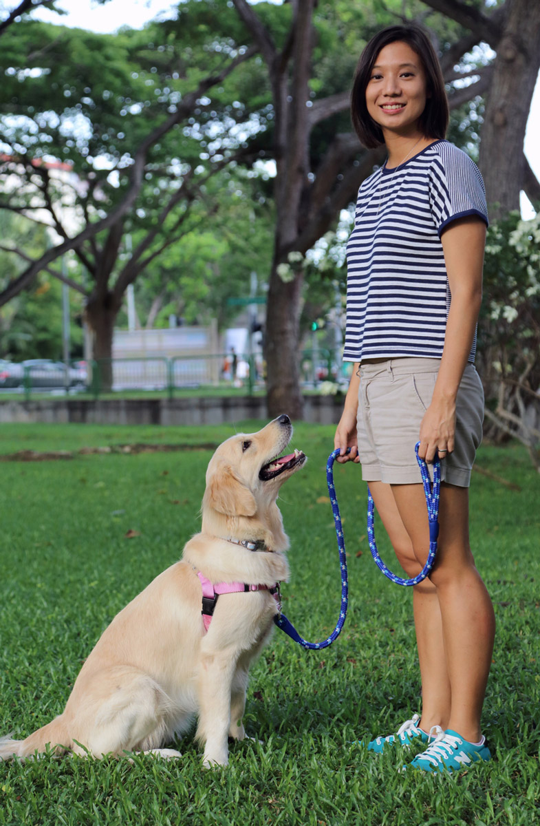 Kristina, our head trainer, with Milly, the Golden Retriever.